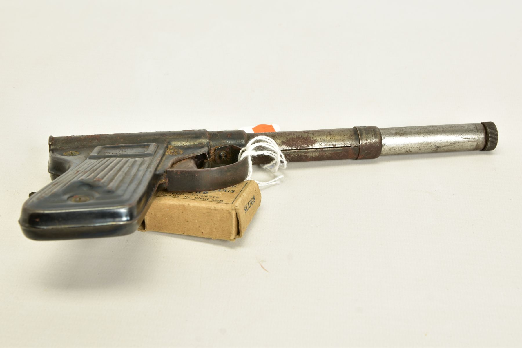 A .177'' BRITON PRESSED STEEL 'GAT' TYPE AIR PISTOL, complete with pellet insertion rod and a packet - Image 6 of 6