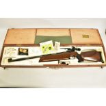 A .177'' FEINWERKBAU MODEL LG TARGET RIFLE, serial number 197313, it comes in a wooden case which
