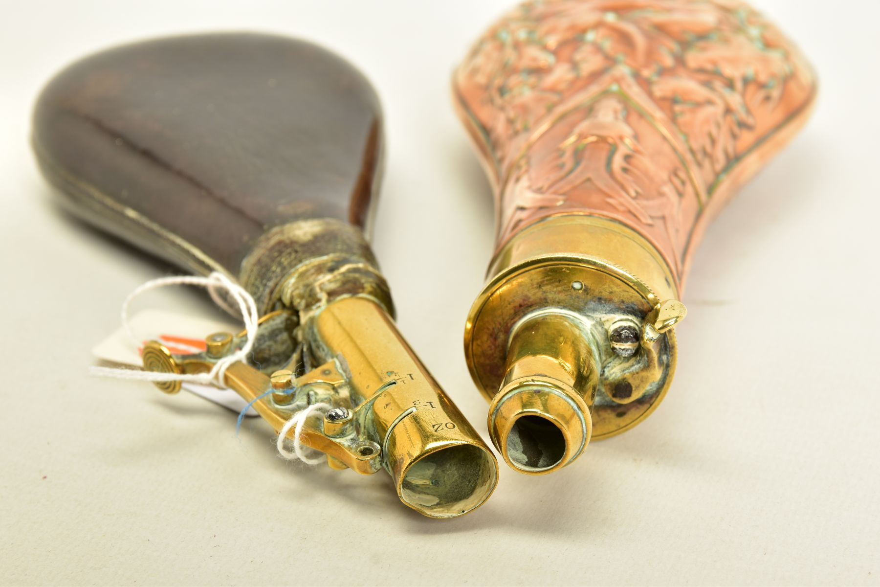 A LEATHER SHOT FLASK, where its brass adjustable nozzle has been glued to the leather shot bag and - Image 4 of 5