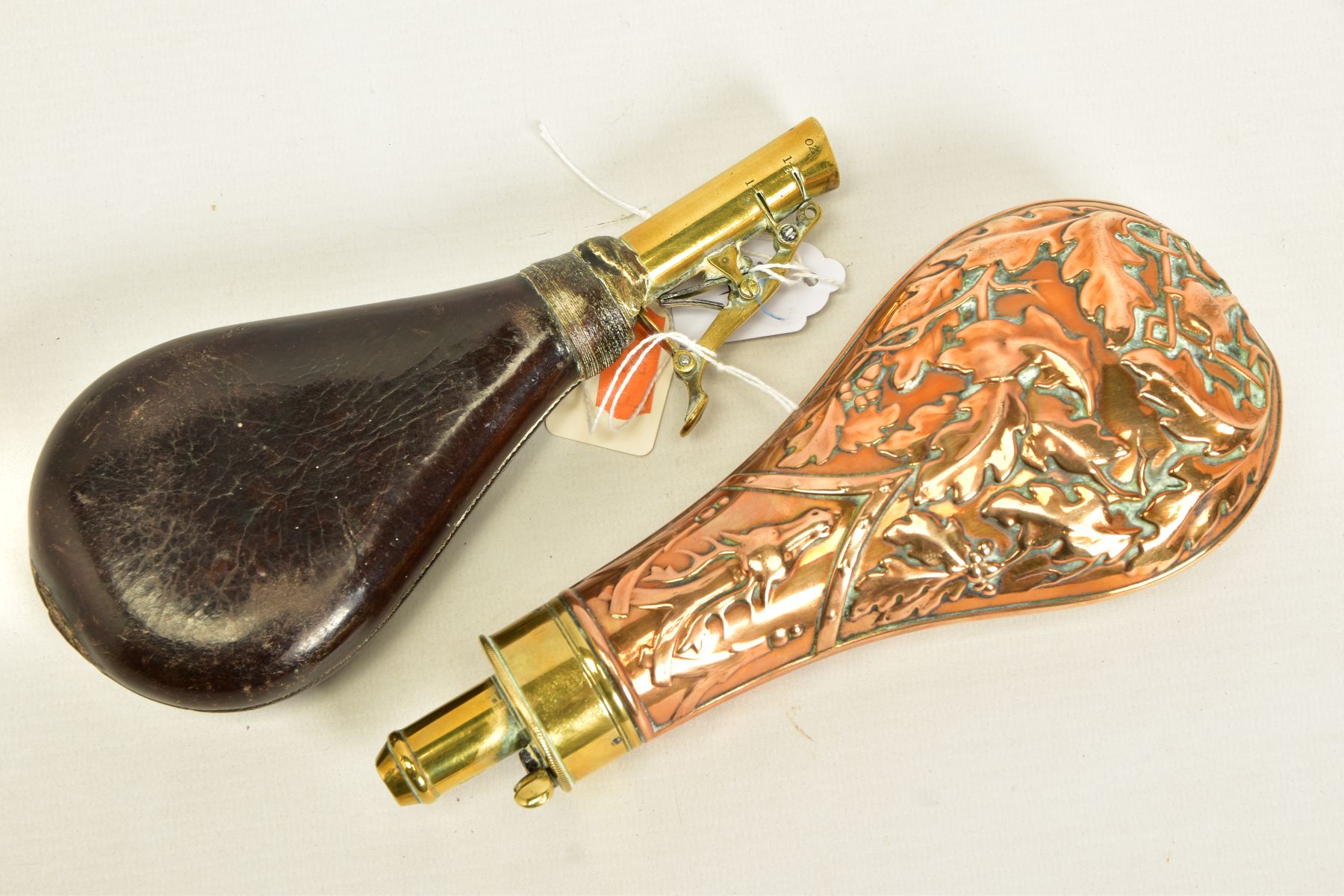 A LEATHER SHOT FLASK, where its brass adjustable nozzle has been glued to the leather shot bag and - Image 2 of 5