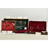 A THREE TIER CASE COVERED WITH SIMULATED LEATHER CONTAINING THE 'LEGENDARY GUN COLLECTION' BY