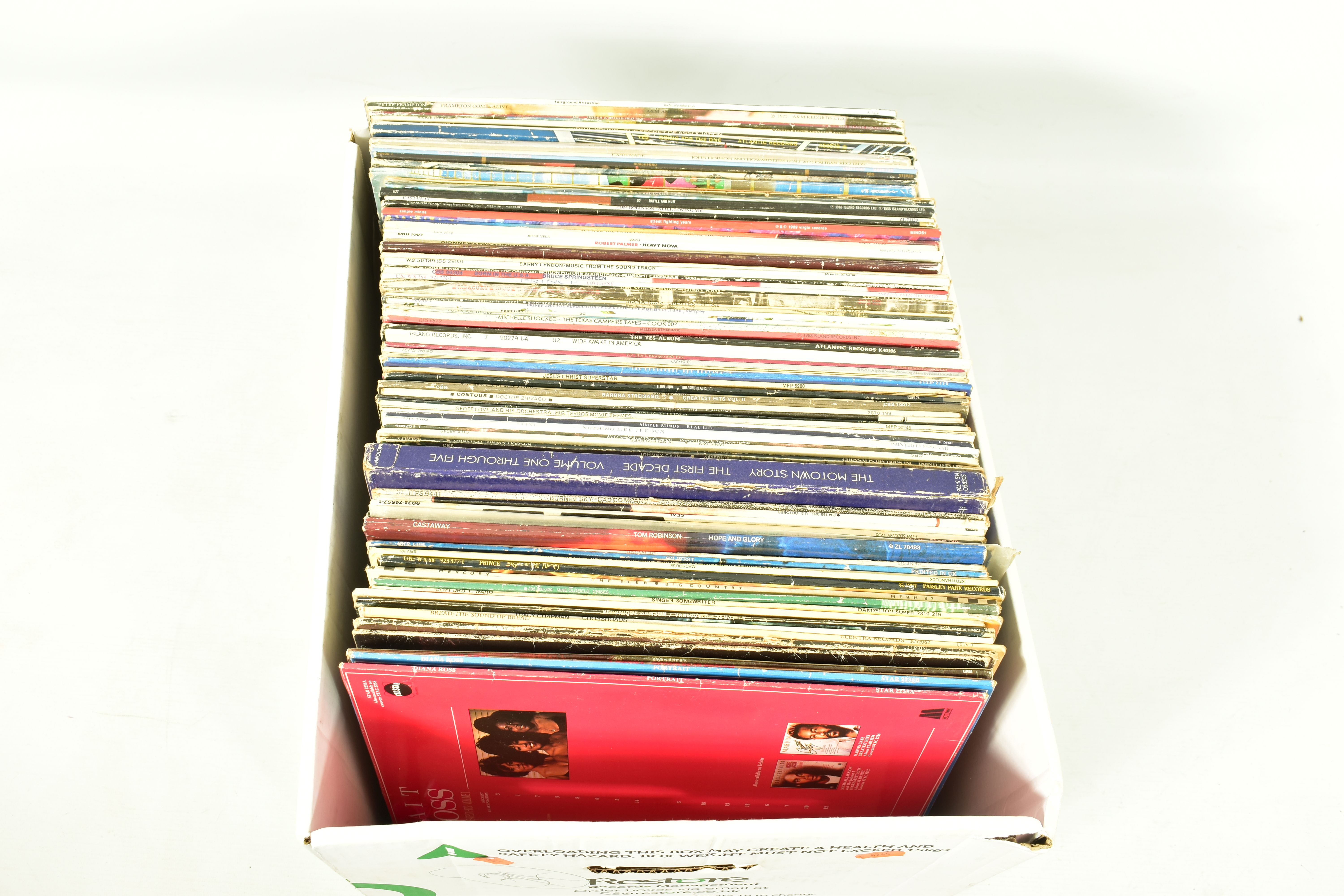 A TRAY CONTAINING APPROX NINETY FIVE LPs AND 12in SINGLES by artists such as Yes, U2, Prince,Bad