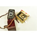 A ROLLEIFLEX AUTOMAT 6X6 K4 50 TLR CAMERA Serial No 1166151 fitted with Tessar 7.5cm f 3.5 with a