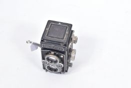 A ROLLEIFLEX AUTOMAT 6x6 MODEL K4B TLR CAMERA Serial No 1491682 ( some covering coming loose and