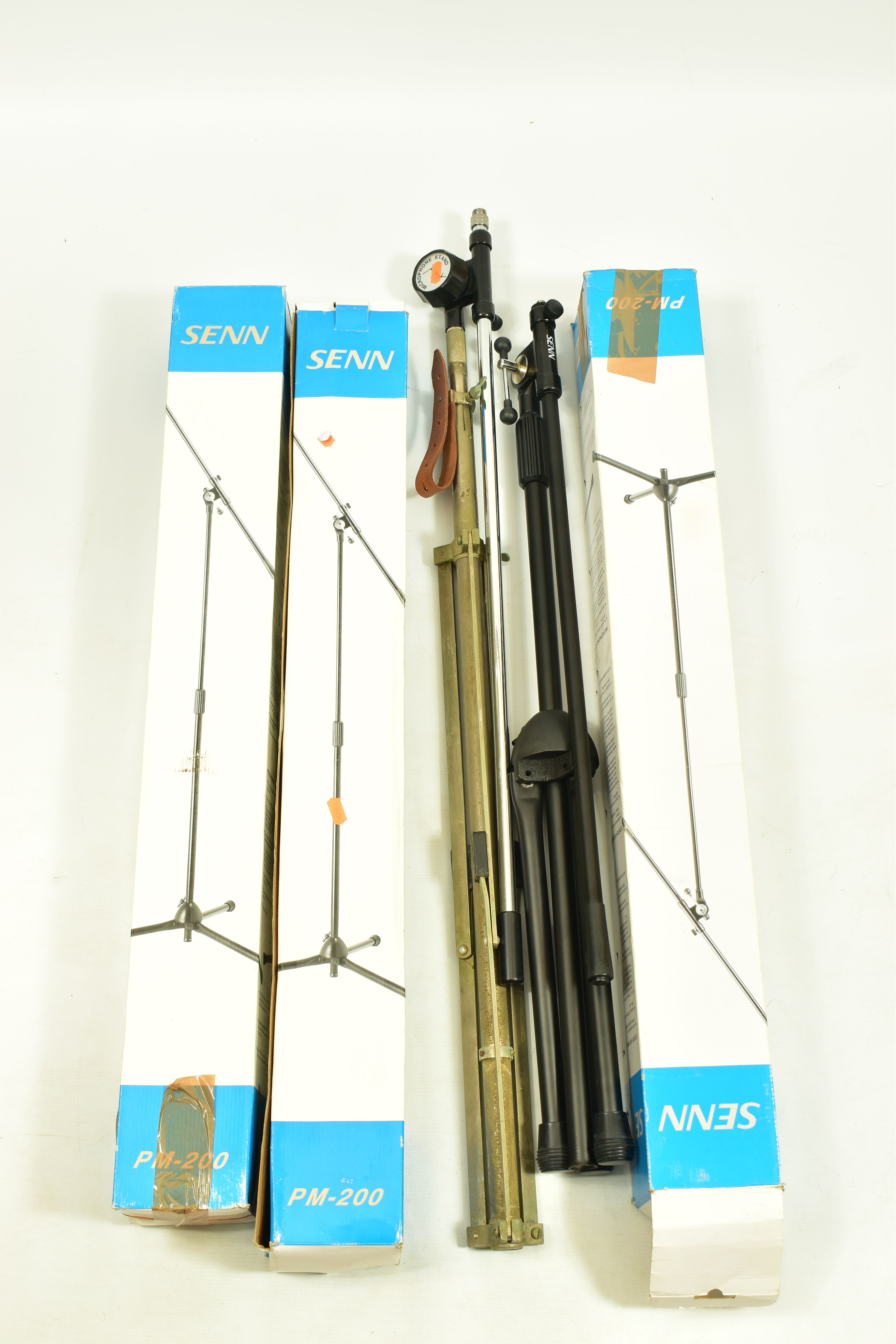 THREE BOXED AND ALMOST NEW SENN PM-200 BOOM MIC STANDS and a vintage straight mic stand with a