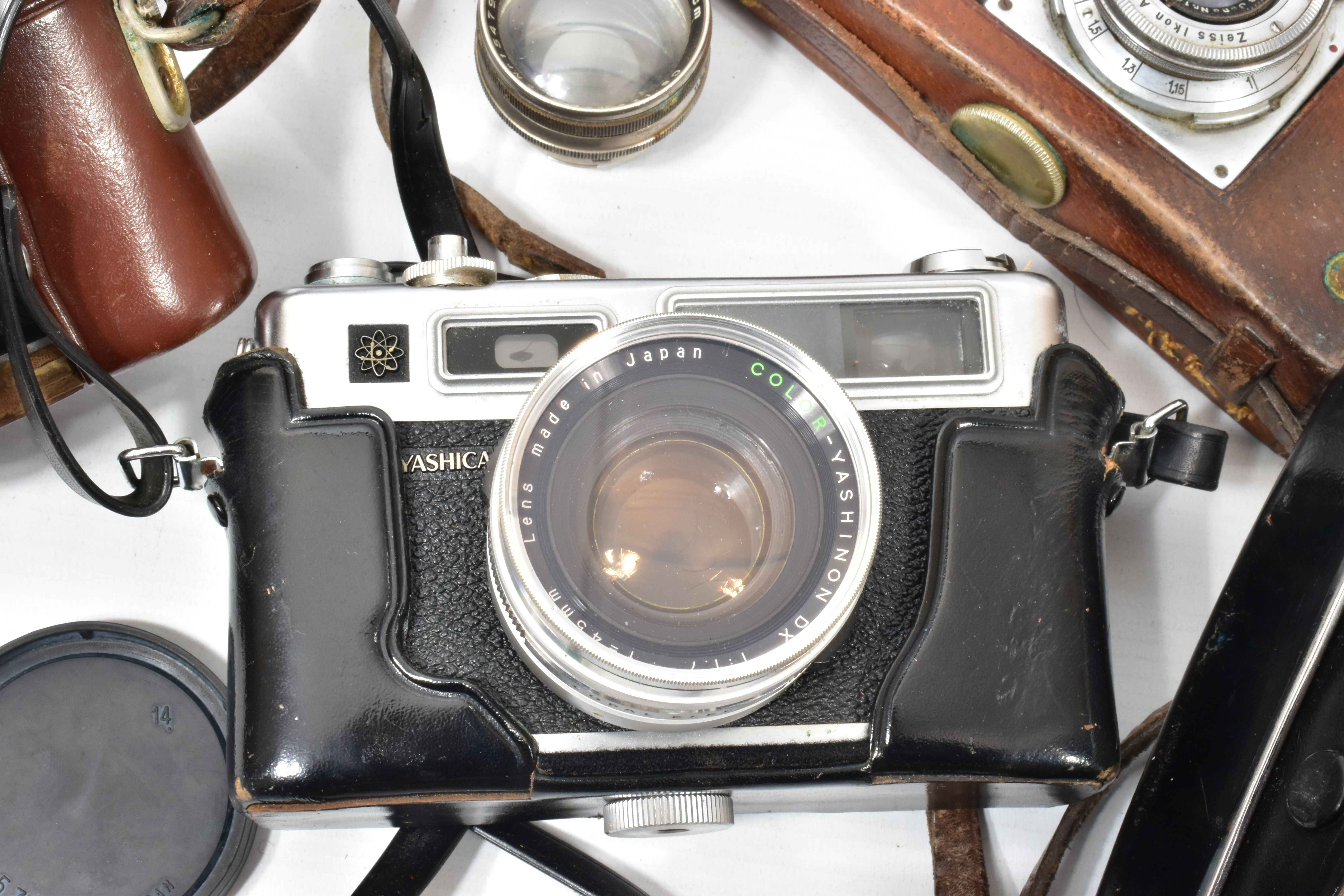 A ZEISS IKON CONTAX 2 SLR CAMERA fitted with a Carl Zeiss Jena Tessar 5cm f2.8 lens in tatty leather - Image 3 of 7