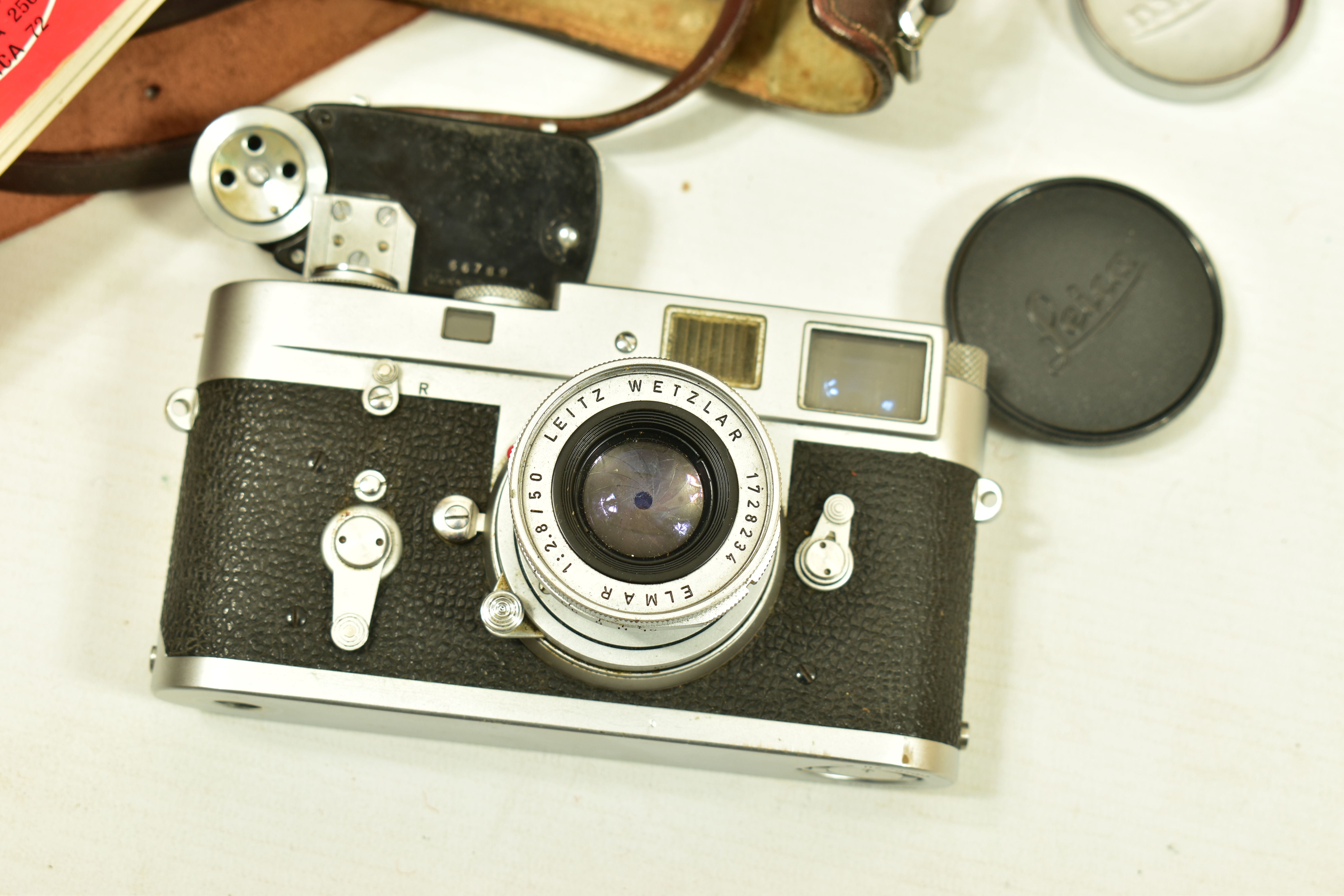 A LEICA M2 FILM CAMERA Serial No 1004152 fitted with an Elmar 50mm f2.8 lens Serial no 1728234 ( - Image 2 of 6