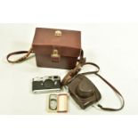 A LEICA M2 FILM CAMERA Serial No 976119 fitted with an Elmar 50mm f2.8lens Serial no 1980377 and