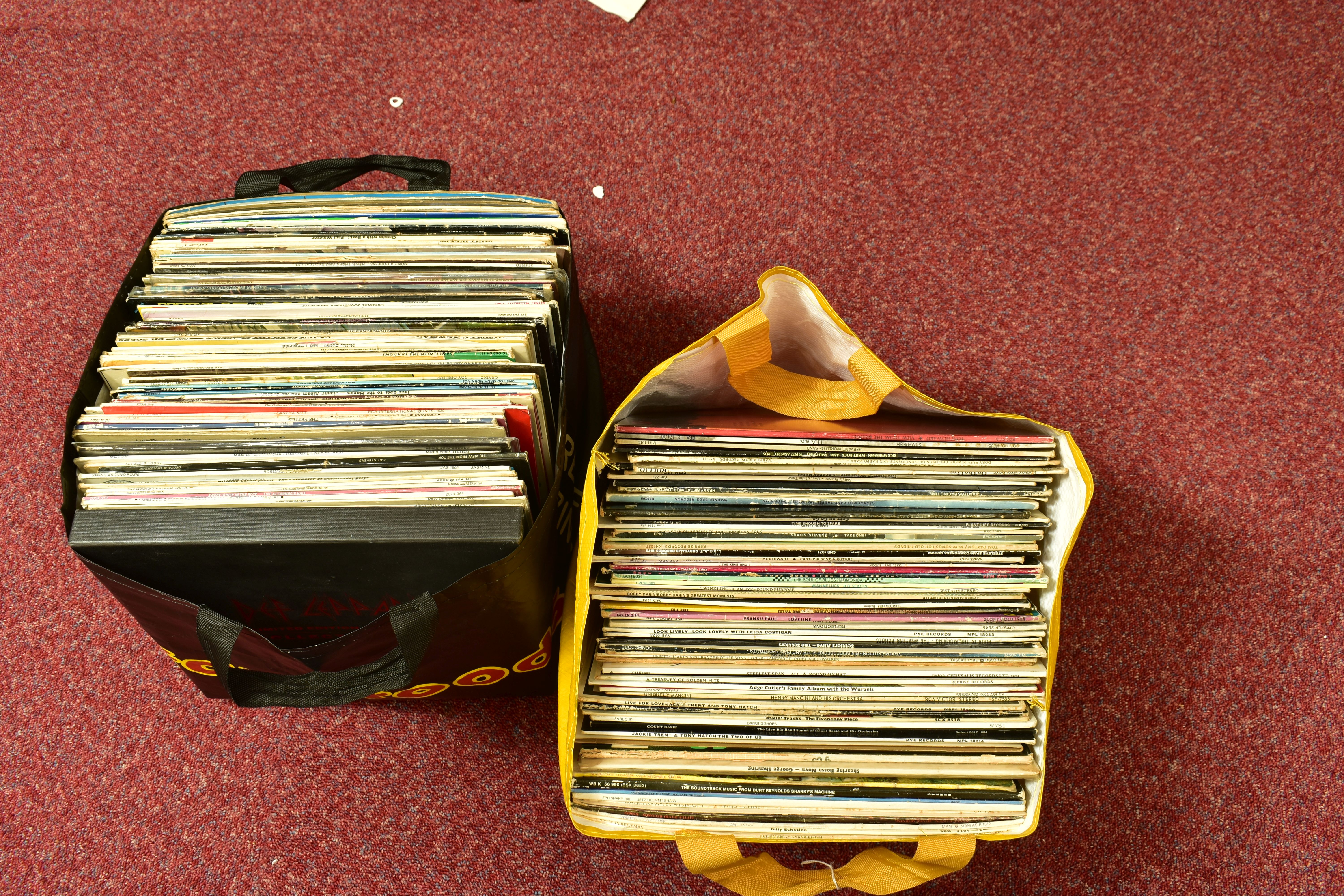 TWO BAGS CONTAINING OVER ONE HUNDRED AND FIFTY LPs by artists such as Cream, Jimmy Ruffin, Mamas and
