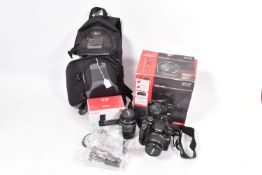 A CANON EOD 400D DIGITAL SLR CAMERA with double zoom kit including boxes for camera, lens and