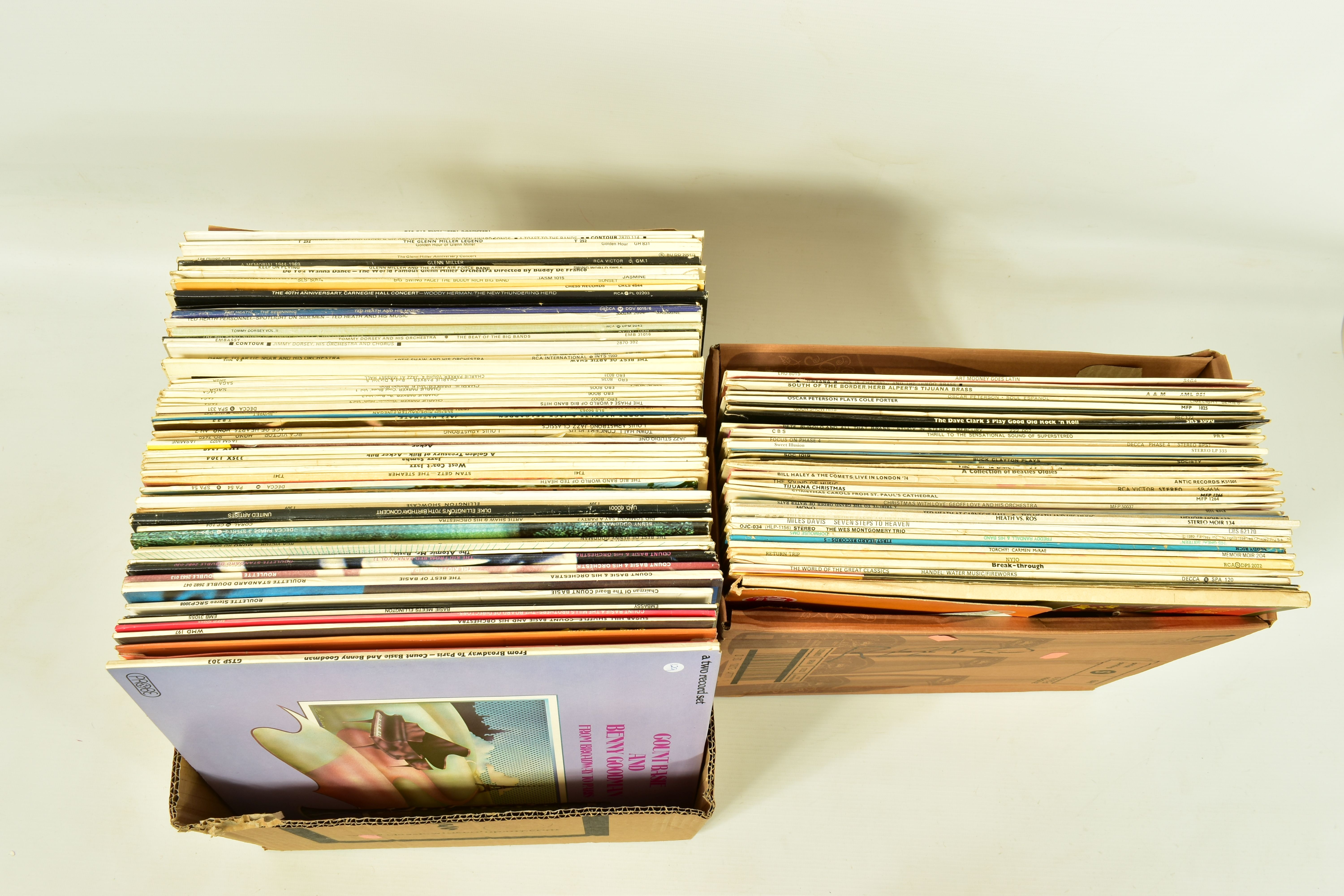 TWO TRAYS CONTAINING OVER ONE HUNDRED LPS OF JAZZ MUSIC artists include Benny Goodman, Charlie