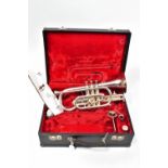 A GETZEN CAPRI SILVERED CORNET Serial Number A29638 with two mouthpieces and case ( condition is