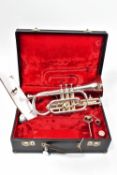 A GETZEN CAPRI SILVERED CORNET Serial Number A29638 with two mouthpieces and case ( condition is