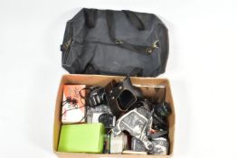 A TRAY CONTAINING CAMERAS AND EQUIPMENT including an Olympus OM1N film SLR camera fitted with a MC