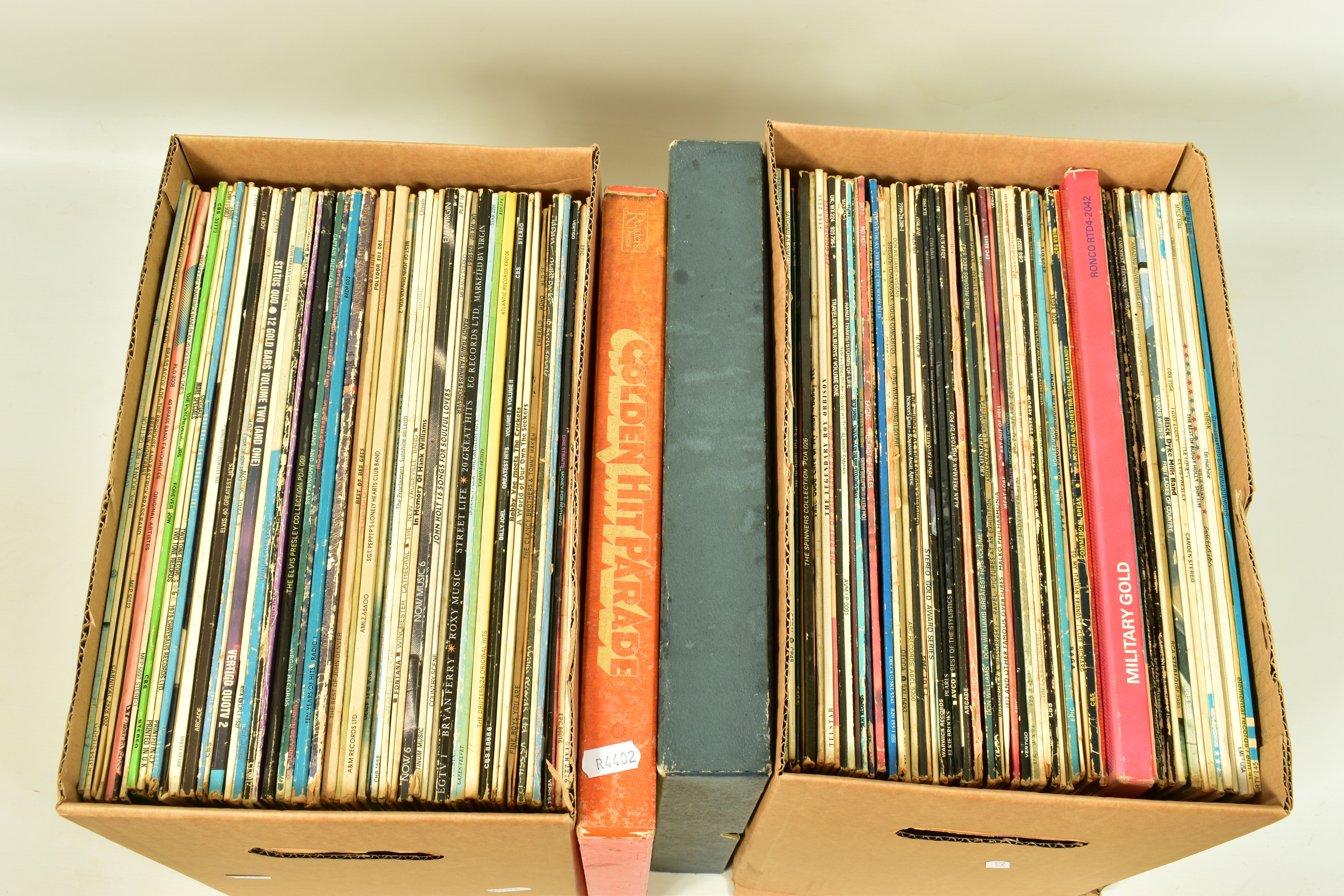 TWO TRAYS CONTAINING OVER ONE HUNDRED LPs by artists such as Rod Stewart, Abba, Queen, Elvis