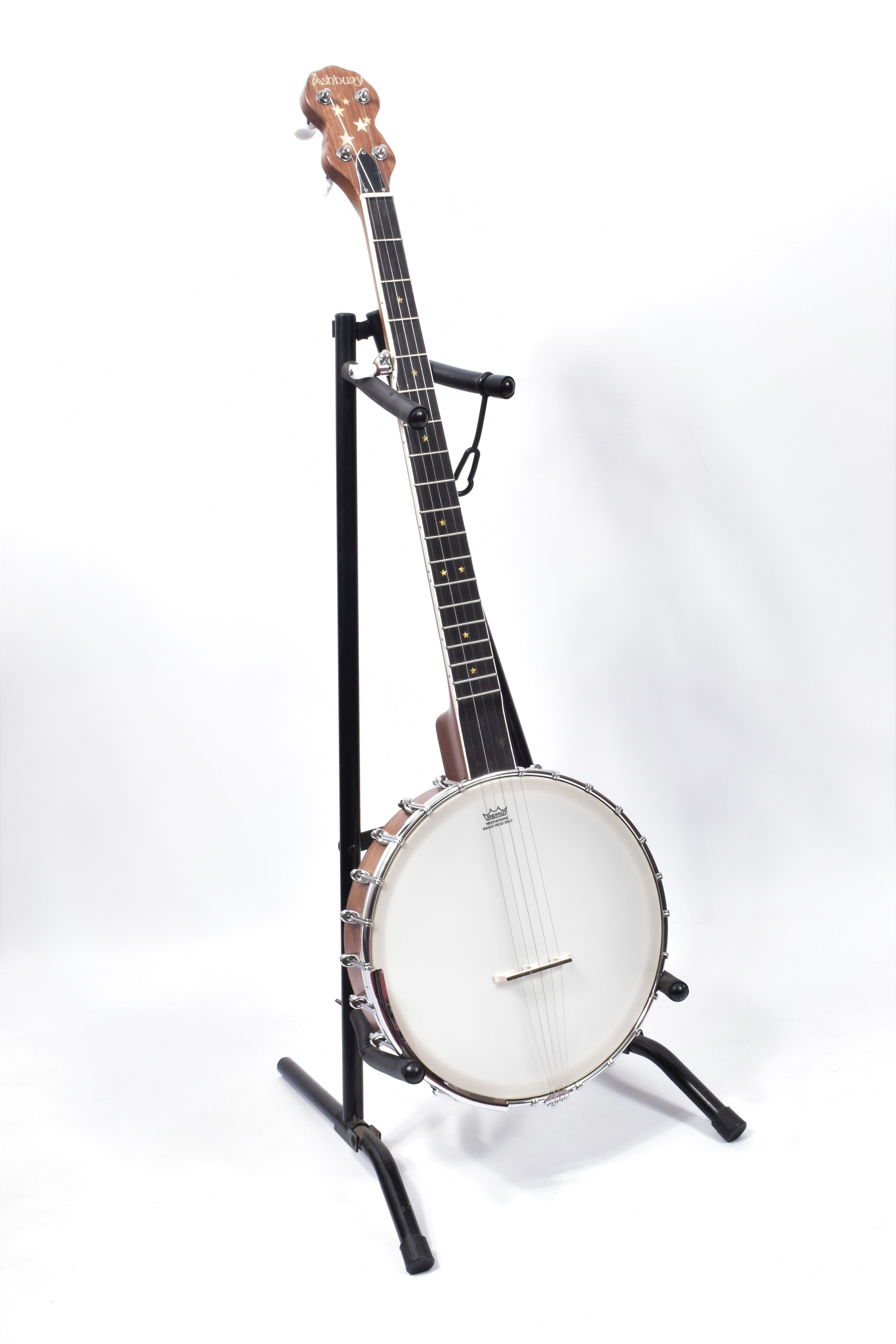 AN ASHBURY OPEN BACKED 5 STRING BANJO with walnut neck and sides, gold coloured Mother of pearl star