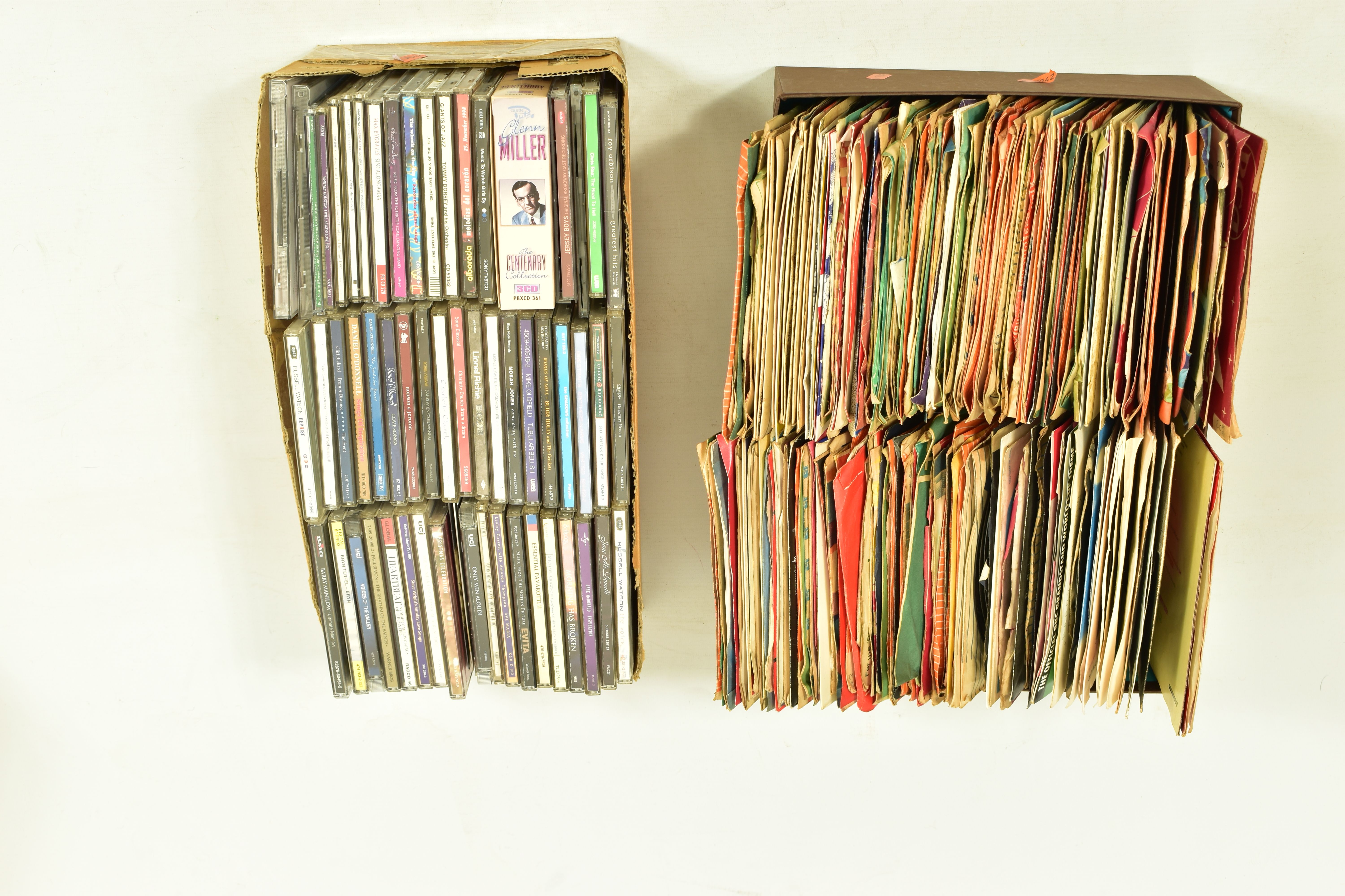 A TRAY CONTAINING APPROX ONE HUNDRED AND NINETY 7in SINGLES AND EPs from the 50s to the 80s