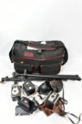 A CCS CANVAS CAMERA BAG containing a Minolta 110 Zoom SLR camera, a Coronet Twenty-20 TLR, a