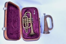 A CASED LAFLEUR BRASS CORNET Serial No 658000 ( brass is tarnished one valve doesnt return and