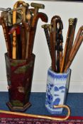 A CHINOISERIE HEXAGONAL STICK STAND, and a Chinese blue and white porcelain stick stand, both