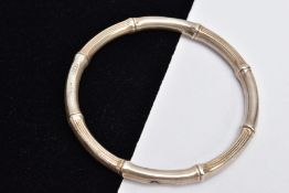 AN ADIE & LOVEKIN SILVER BANGLE, Chester circa 1915, in bamboo form, internal diameter 6.5cm,