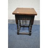 A 20TH CENTURY OAK JOINT STOOL, turned supports united by a box stretcher, 33cm squared x height