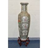 A LARGE CANTON FAMILLE ROSE ENAMELLED HANDPAINTED BALUSTER VASE, on hardwood carved stand,the vase