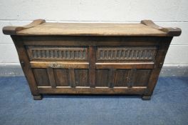 A 20TH CENTURY OAK BLANKET CHEST, possibly Rupert Griffiths, the hinged plank top over an