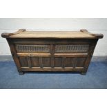 A 20TH CENTURY OAK BLANKET CHEST, possibly Rupert Griffiths, the hinged plank top over an
