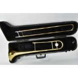 A BACH. U.S.A. TROMBONE in bras with chromed detailing, a Denis Wick, London 4BS mouthpiece and