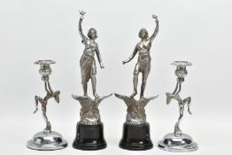A PAIR OF ART DECO CHROME FIGURES, with a pair of Art Deco chrome candle holders, the chrome figures