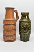 A WEST GERMAN POTTERY JUG WITH AN ART POTTERY VASE, the West German jug measuring 45cm high, being