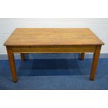 A VICTORIAN PINE FARMHOUSE KITCHEN TABLE, of a rectangular form, with a five plank top, drawers to