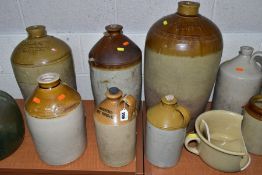 A QUANTITY OF STONEWARE JARS AND FLAGONS, etc, with two vintage bottle vases, the tallest flagon