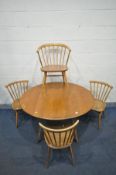 AN ERCOL WINDSOR OVAL TOP DINING TABLE, open length 125cm x closed length 65cm x depth 112cm x