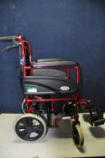 A Z-TEC WHEELCHAIR a folding assisted wheelchair max weight 116kgs (in good used condition)