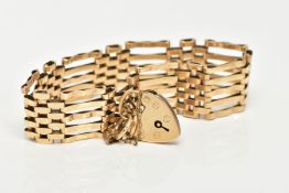 A WIDE 9CT GOLD GATE BRACELET, five bar gate bracelet approximate width 16.4mm, fitted with a