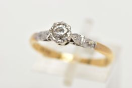 A YELLOW AND WHITE METAL SINGLE STONE DIAMOND RING, illusion set round brilliant cut diamond,