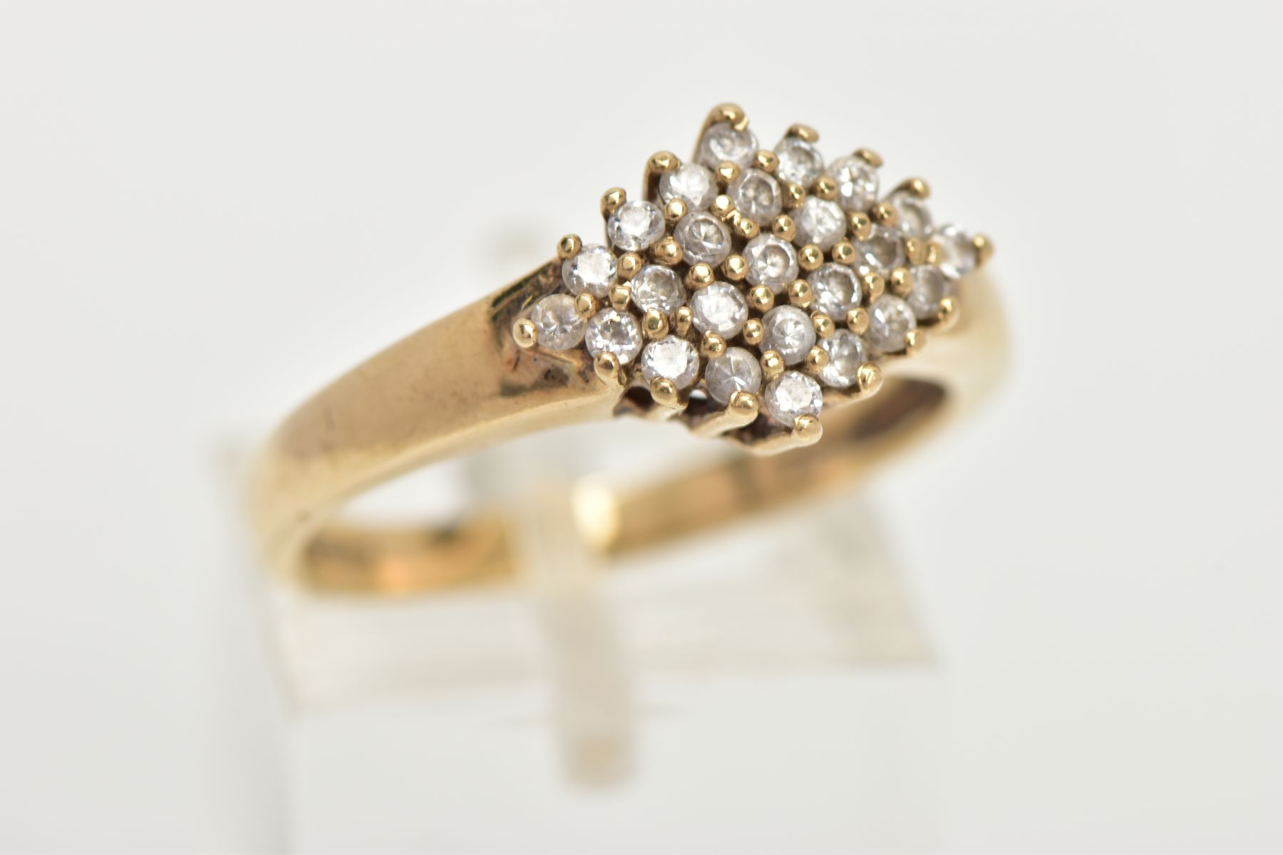 A 9CT GOLD CUBIC ZIRCONIA RING, of a lozenge shape set with a cluster of colourless cubic zirconia - Image 5 of 6