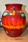 A POOLE POTTERY VOLCANO PATTERN VASE OF BALUSTER FORM, red, orange, blue and green glazes, moulded