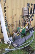 A COLLECTION OF GARDEN TOOLS and two parasols without bases