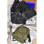 SEVEN USED / MOULD DAMAGED PRADA RUCKSACKS/ COMPUTER BAGS/ HOLDALL, together with eleven fabric