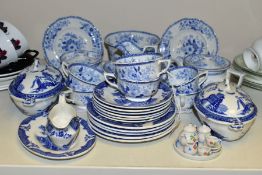 A GROUP OF TOY TEA WARES, over thirty five pieces to include a blue and white tea set, possibly by