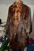 A LADIES SQUIRREL FUR COAT, A FUR STOLE AND A BROWN FUR COAT AND A LADIES TIE, the squirrel fur with