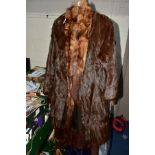 A LADIES SQUIRREL FUR COAT, A FUR STOLE AND A BROWN FUR COAT AND A LADIES TIE, the squirrel fur with