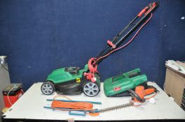 A QUALCAST MEB1434M LAWN MOWER with grass box (PAT pass and working) and a Black and Decker hedge