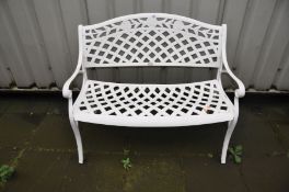 A MODERN CAST ALUMINIUM GARDEN BENCH with lattice and foliate detail to back and seat width 102cm