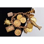 A HEAVY 9CT GOLD CHARM BRACELET WITH CHARMS AND SOVEREIGNS, curb link chain each link stamped 9.375,