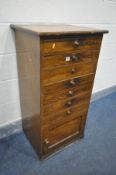 AN EARLY 20TH CENTURY SCUMBLED PINE HABADASHERY CHEST OF SEVEN DRAWERS, each drawer with