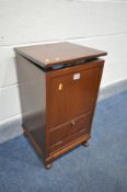 A MAHOGANY SEWING BOX, containing a quantity of sewing equipment